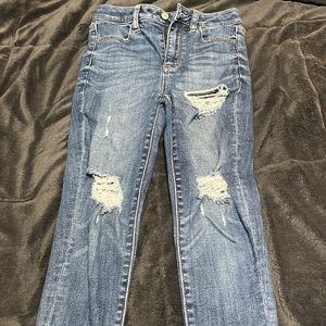 Size 0 super stretchy American eagle ripped jeans (short length)